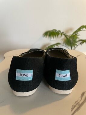 TOMS Black Canvas Slip-On Shoes with Light Blue Logo Patch